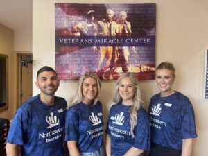 northeastern insurance volunteer week at veteran's miracle center